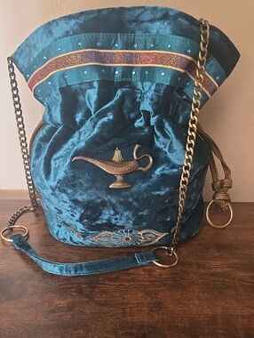Teal Velvet Drawstring Bucket Bag with Gold Lamp Accent
